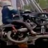 Kanpur man refuses to let go of bike even as traffic police tows it away