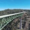 Woman falls off tallest California bridge while taking selfie, survives