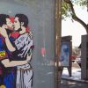 Lionel Messi, Cristiano Ronaldo kissing graffiti causes stir before El Clasico