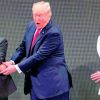 Donald Trump breaks the handshake chain