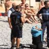 French police force sunbathing Muslim woman to remove her top
