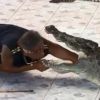 Video: Crocodile attacks reptile handler as he puts his hand in its mouth