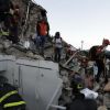 Italy searches for survivors as quake toll hits 247, town reduced to rubble