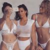 Kim Kardashian flashes nipples in transparent white bikini
