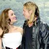 Angelina Jolie plans to adopt, Brad Pitt upset
