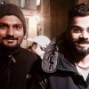 Spotted: Anushka goes behind the lens to click Virat's picture with fan in Prague!