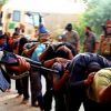 ISIS hangs 40 bodies from poles