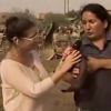 Woman breastfeeds a baby pig on live television in Peru