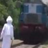 Watch: Shocking video of an old man challenging a speeding train