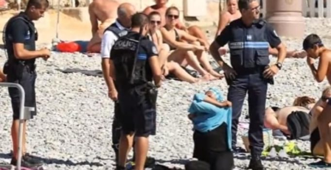 French police force sunbathing Muslim woman to remove her top