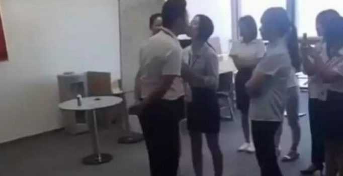 Women have no choice but to kiss their boss at this Chinese company