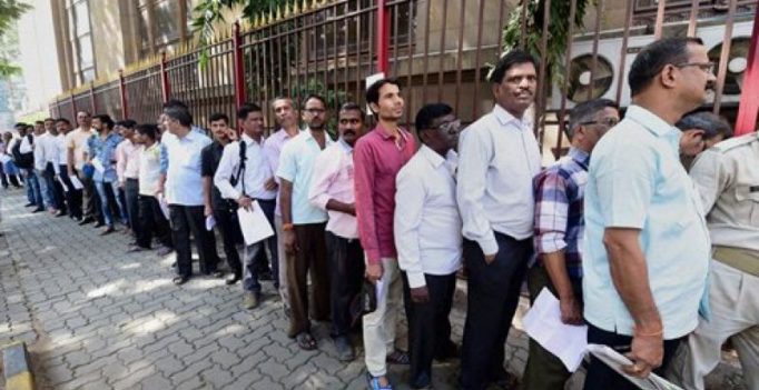 As banks reopen, people line up in long queues across the country