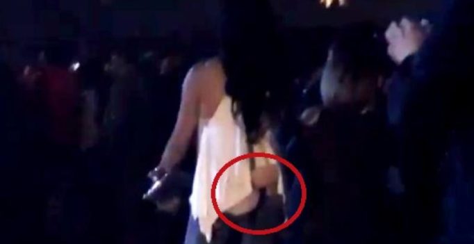Video: Woman’s butt implants pop out at concert, footage goes viral