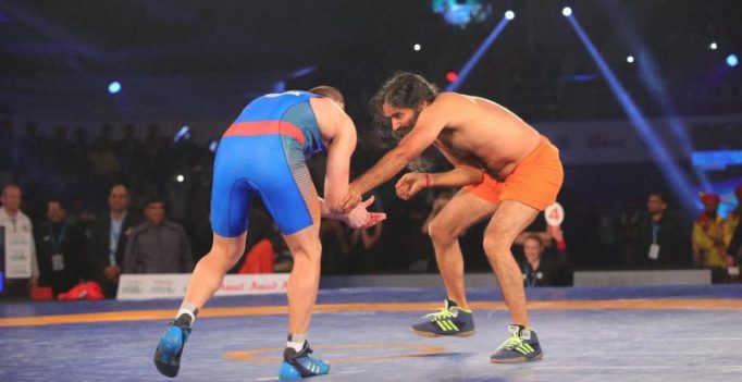 Watch: Baba Ramdev wrestles, beats Olympic medallist 12-0