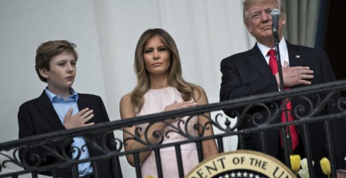 Video: First Lady Melania nudges President Trump during national anthem