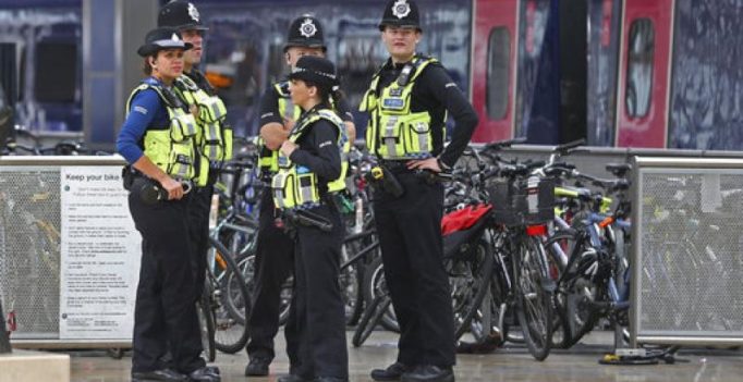 Britain lowers threat level after 2nd arrest in Underground train attack