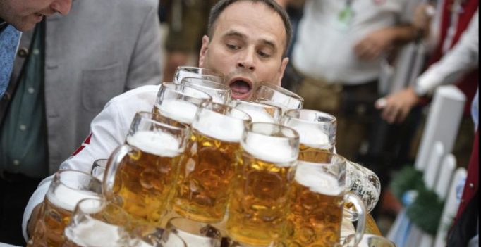 German barman smashes world record, carries 27 litre steins of beer for 131 feet