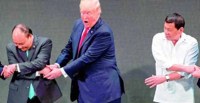Donald Trump breaks the handshake chain