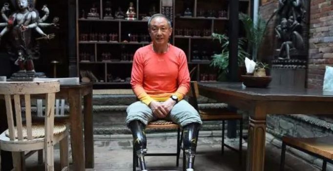 Chinese double amputee finally summits Everest, decades after first bid