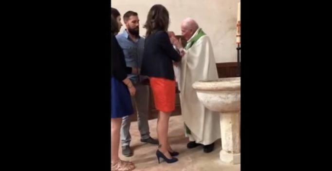 Video: Relatives snatch baby from priest after he slaps it for crying during baptism