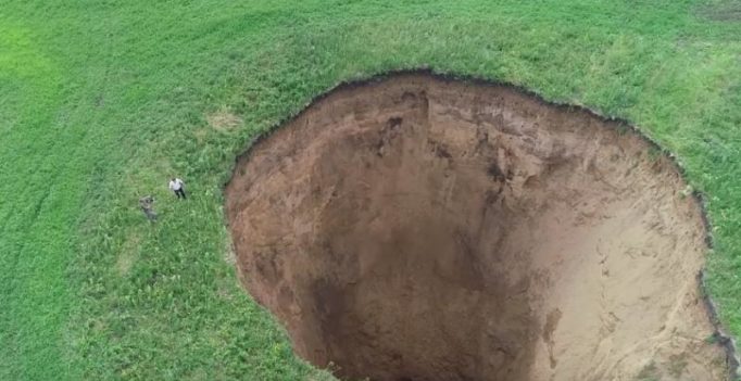 Watch: Massive sinkhole mysteriously emerges overnight in Russian village